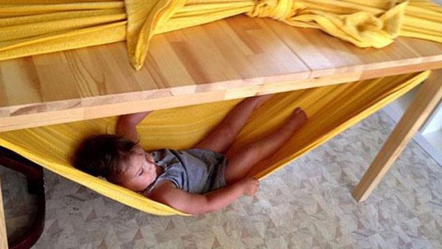 Make A Child-Friendly Hammock With A Bed Sheet And A Table