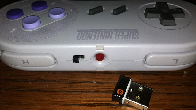 Hack Wireless Into A SNES Controller With A Logitech Receiver