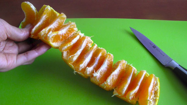 Don’t Peel Oranges: Quickly Unroll Them In A Strip Instead