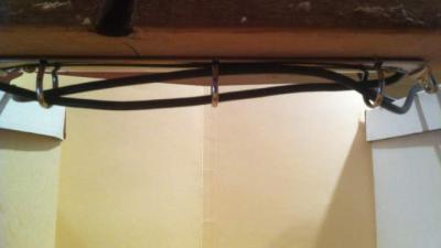 Tame Under-The-Desk Cables With A Broken Three-Ring Binder