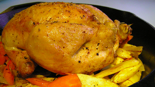 Roast A Whole Chicken In Half The Time With A Preheated Frying Pan