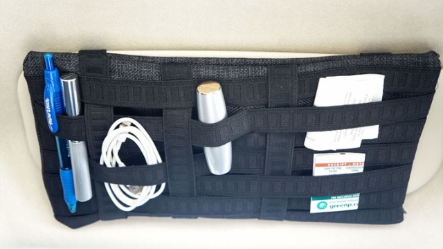 Mount A Grid Organiser In Your Car To Keep Important Stuff At Hand
