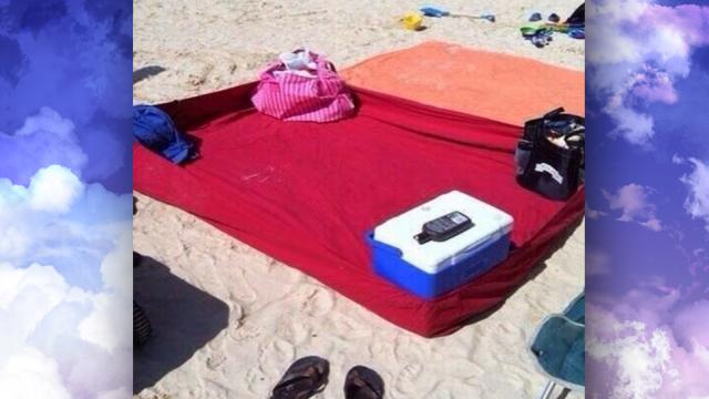 Use A Fitted Sheet To Make A Sand-Free Blanket At The Beach