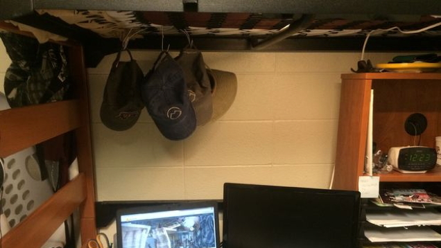 Store Baseball Caps On Your Bunk Bed With A Wire Hanger