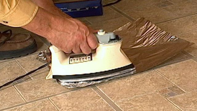 Fix Curling Vinly Floor Tiles With A Clothes Iron