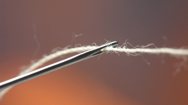 Thread Needles Faster By Spraying Them With Hairspray