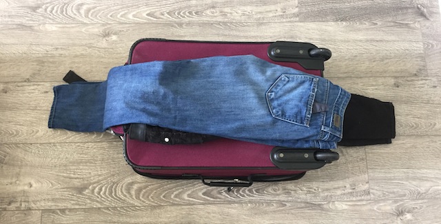 Fit Everything In One Carry-On By Interfolding Clothes Into A Bundle