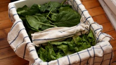 Keep Leafy Greens Fresh In A Towel-Lined Crisper Drawer