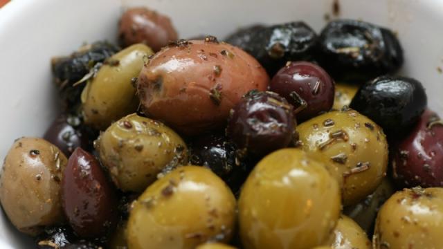 Quickly Pit Olives With The Flat Of A Knife