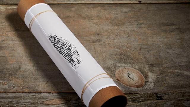 Uncurl Posters Faster By Rolling Them Around A Shipping Tube