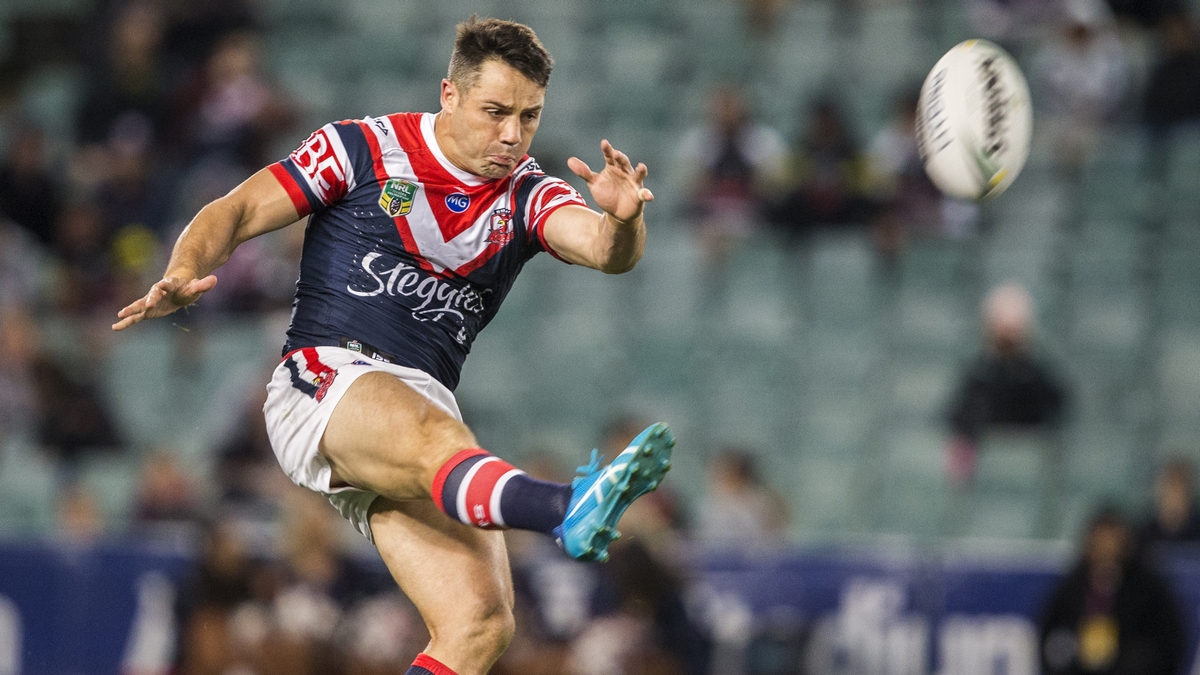 nrl 2020 SYDNEY, AUSTRALIA - JUNE 15: Cooper Cronk of the Roosters kicks the ball during the round 15 NRL match between the Sydney Roosters and the Penrith Panthers at Allianz Stadium on June 15, 2018 in Sydney, Australia. (Photo by Jenny Evans/Getty Images)
