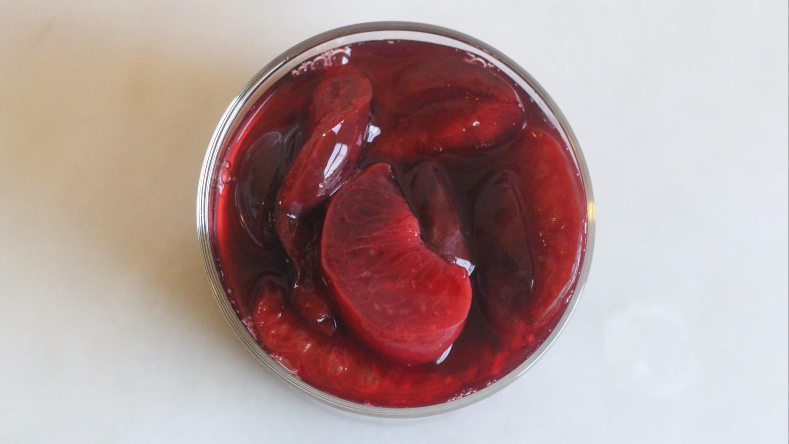 Beautiful fermented plums swimming in tangy brine (Photo: Claire Lower)