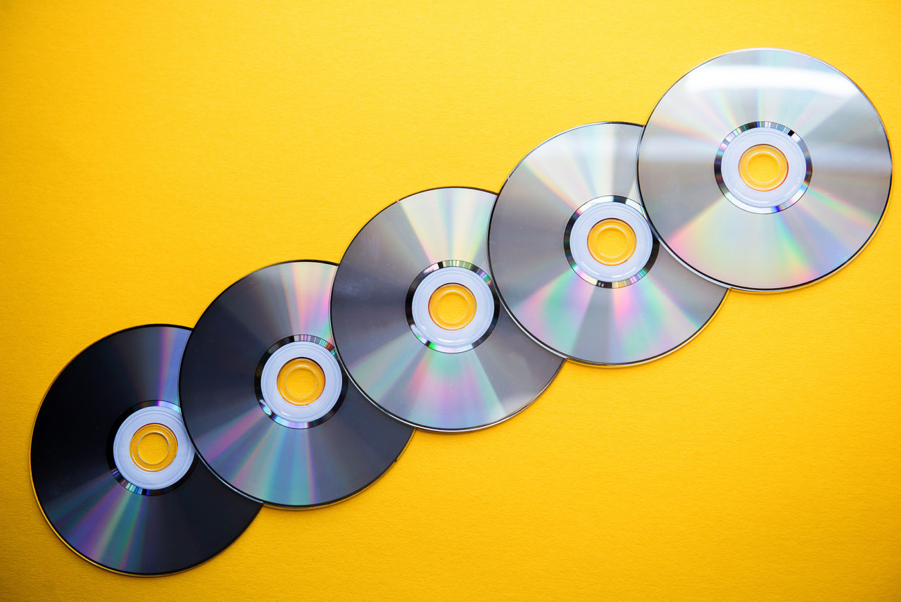 Желтого цвета компакт диск. Компакт-диск обои. DVD фон. Boa CD-DVD.