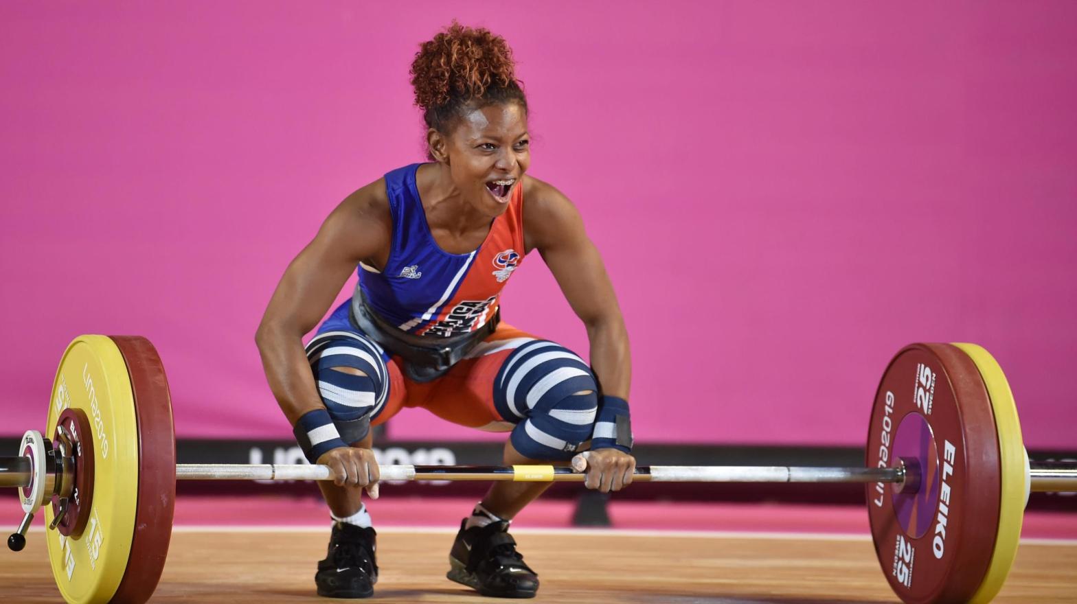 Weightlifter Beatriz Piron (from the Dominican Republic) winning gold in the 49kg weight class at 2019 Pan-Ams (Photo: CRIS BOURONCLE/AFP, Getty Images)
