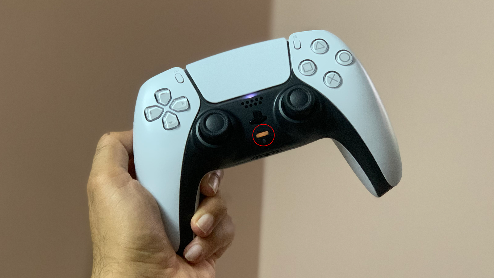 The microphone mute button on PS5's DualSense controller. (Photo: Pranay Parab)