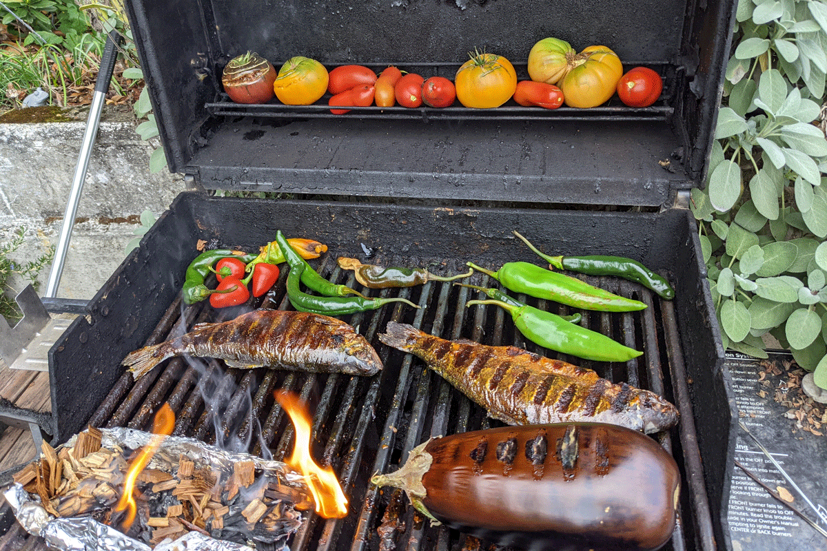 Line up your chips so they burn for longer, and start the fire at one end. Grab whatever else is around and smoke that, too.  (Image: Amanda Blum’s Redhead Grill)