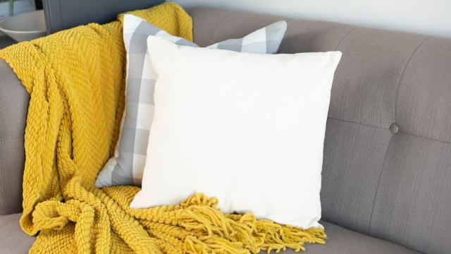 You’re Not Washing Your Throw Blankets Enough (and It’s Gross)