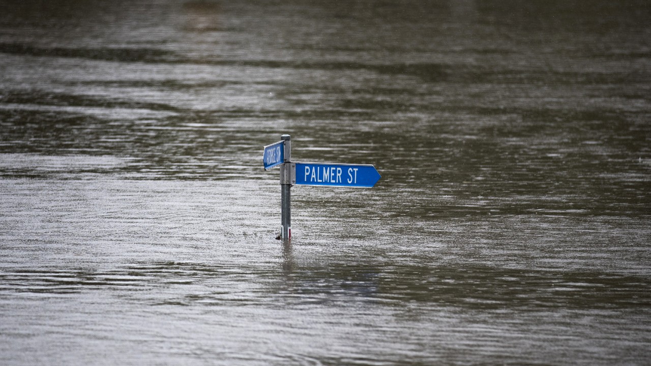 flooded street sign