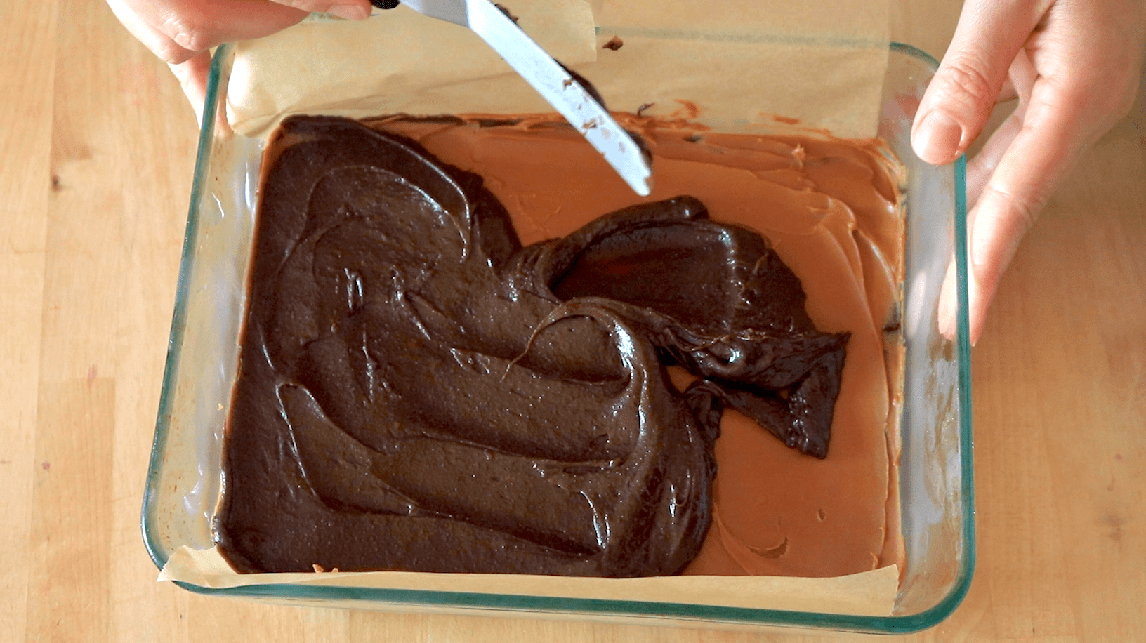 5th layer: Brownie batter spread over the cookie butter. (Photo: Allie Chanthorn Reinmann)