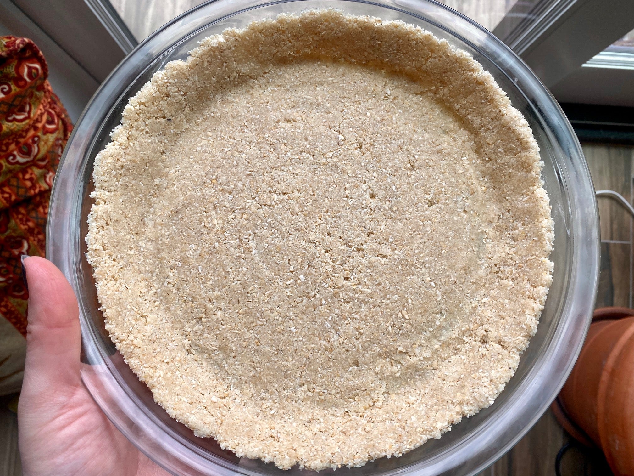 Almond-oat crust, pre-bake. (Photo: Allie Chanthorn Reinmann)