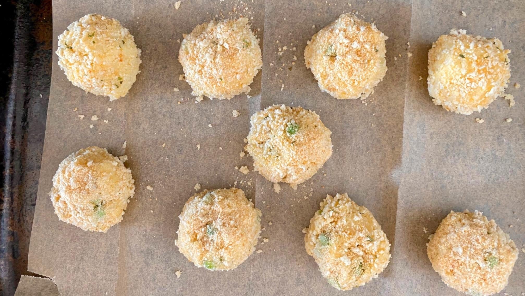 Cauliflower arancini rolled and breaded, ready to fry. (Photo: Allie Chanthorn Reinmann)