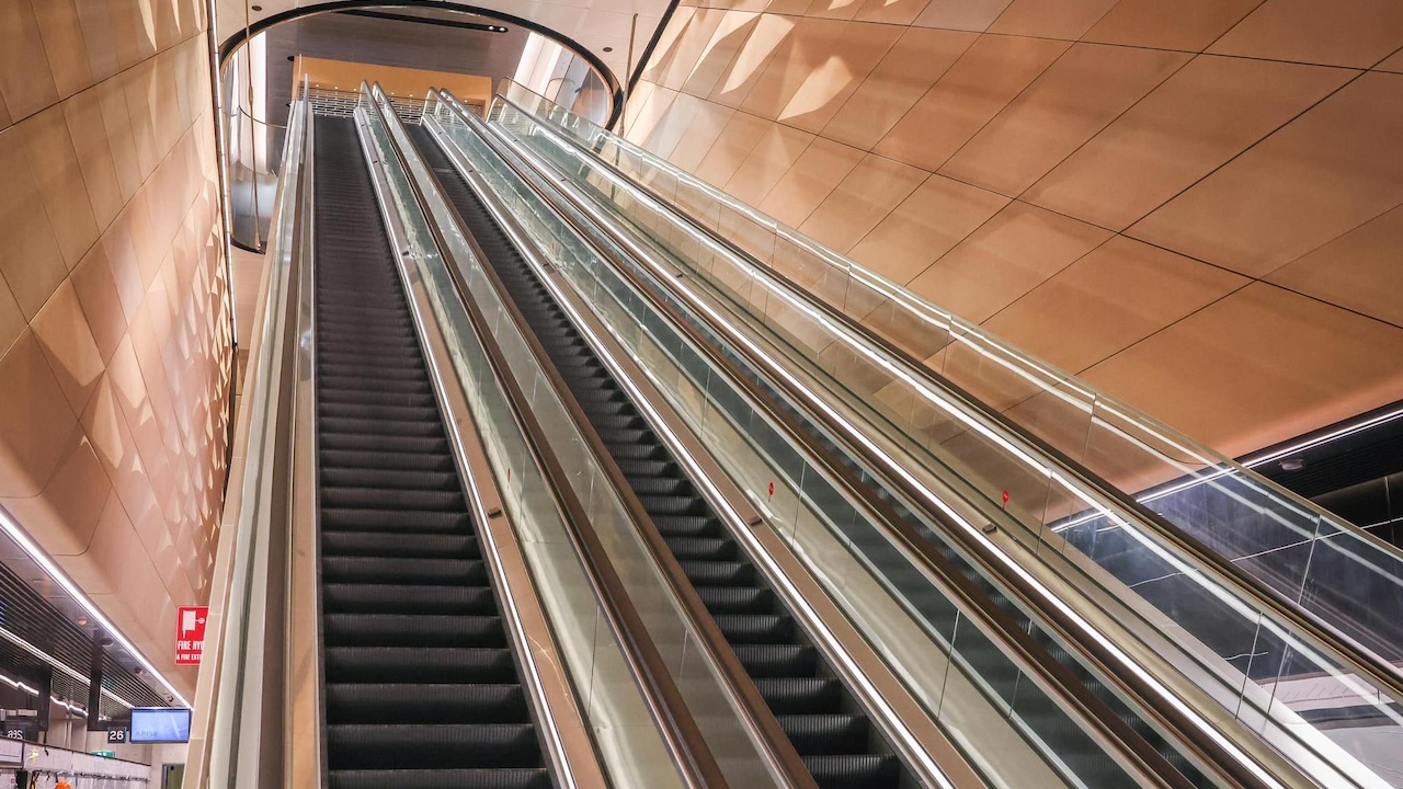 A picture of a really long escalator in Sydney