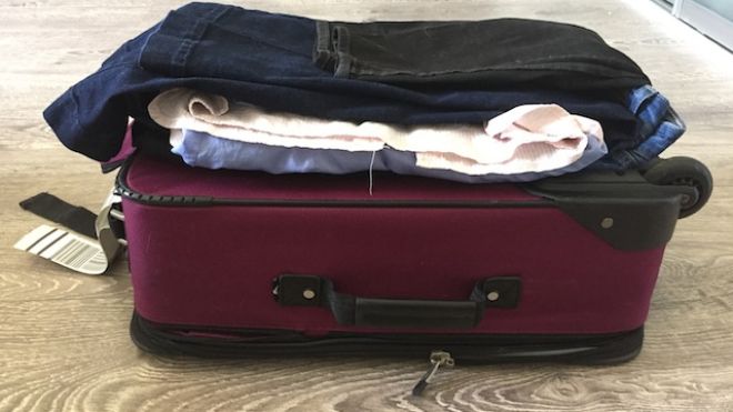 Fit Everything In One Carry-On By Interfolding Clothes Into A Bundle
