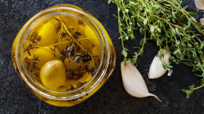 Make Your Garlic Last Longer And Taste Amazing With Garlic Confit