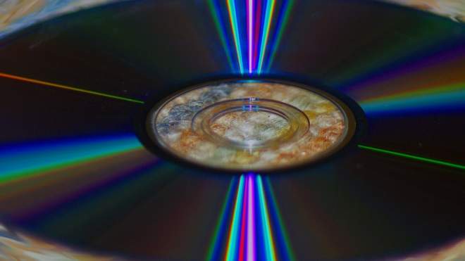 Drill Straighter Holes By Using An Old CD As A Guide