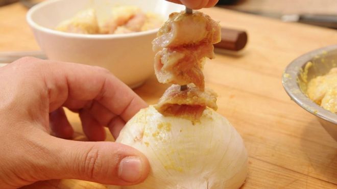 Skewer Food, Not Your Hands, With The Help Of An Onion