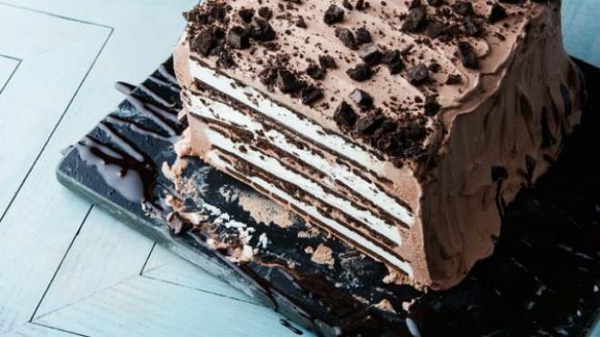The Easiest, Tastiest Ice Cream Cake Is Just Ice Cream Sandwiches Stacked And Frosted