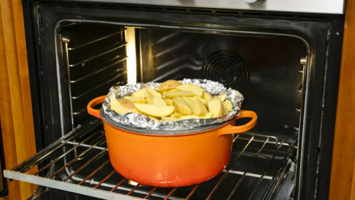 Make Your Dutch Oven Pull Double Duty By Flipping Over Its Lid And Using It As A Baking Sheet