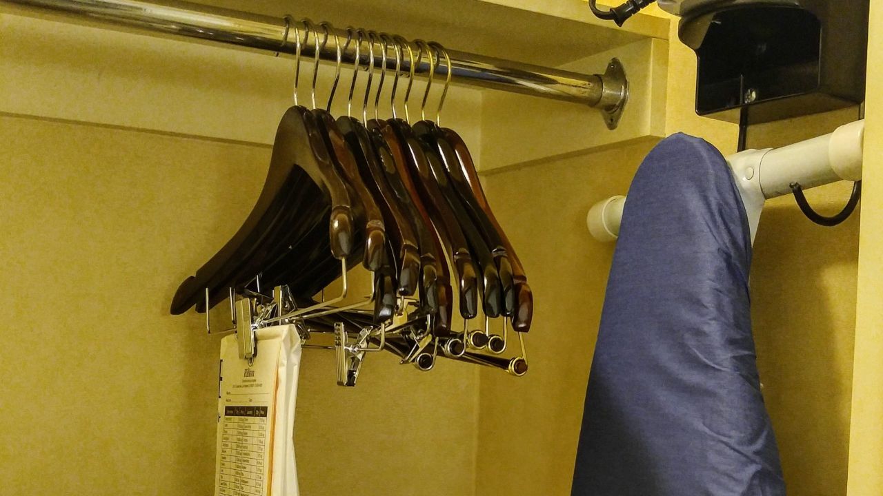 Clip Your Hotel Curtains Shut With A Closet Hanger