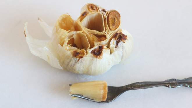 Easily Extract Roasted Garlic Cloves With This Tool 