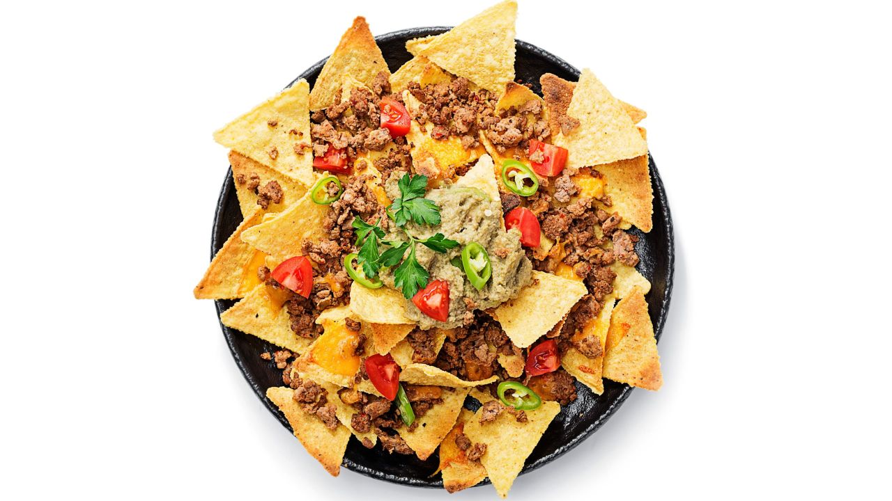 Make Next-Level Nachos by Melting Shredded Cheese in Queso