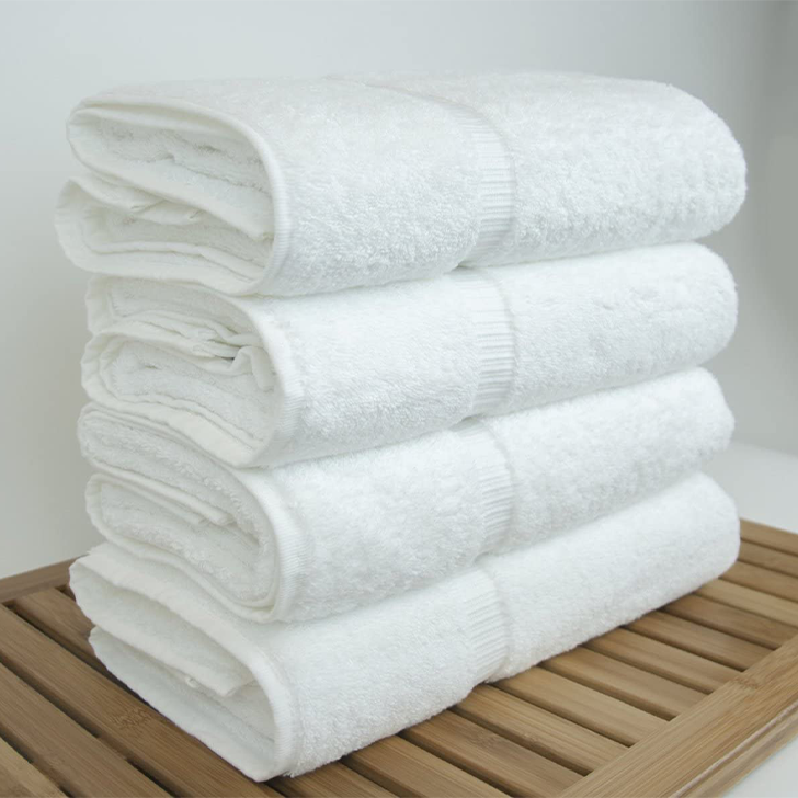 These Luxury Bath Towels Are Perfect for Laying on Your Bed and Contemplating Life in