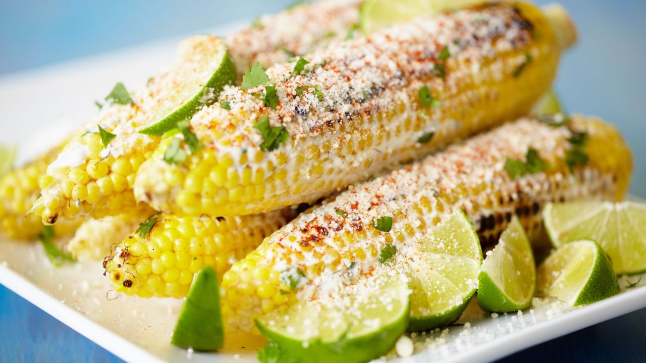 Mexican street corn on rectangular platter