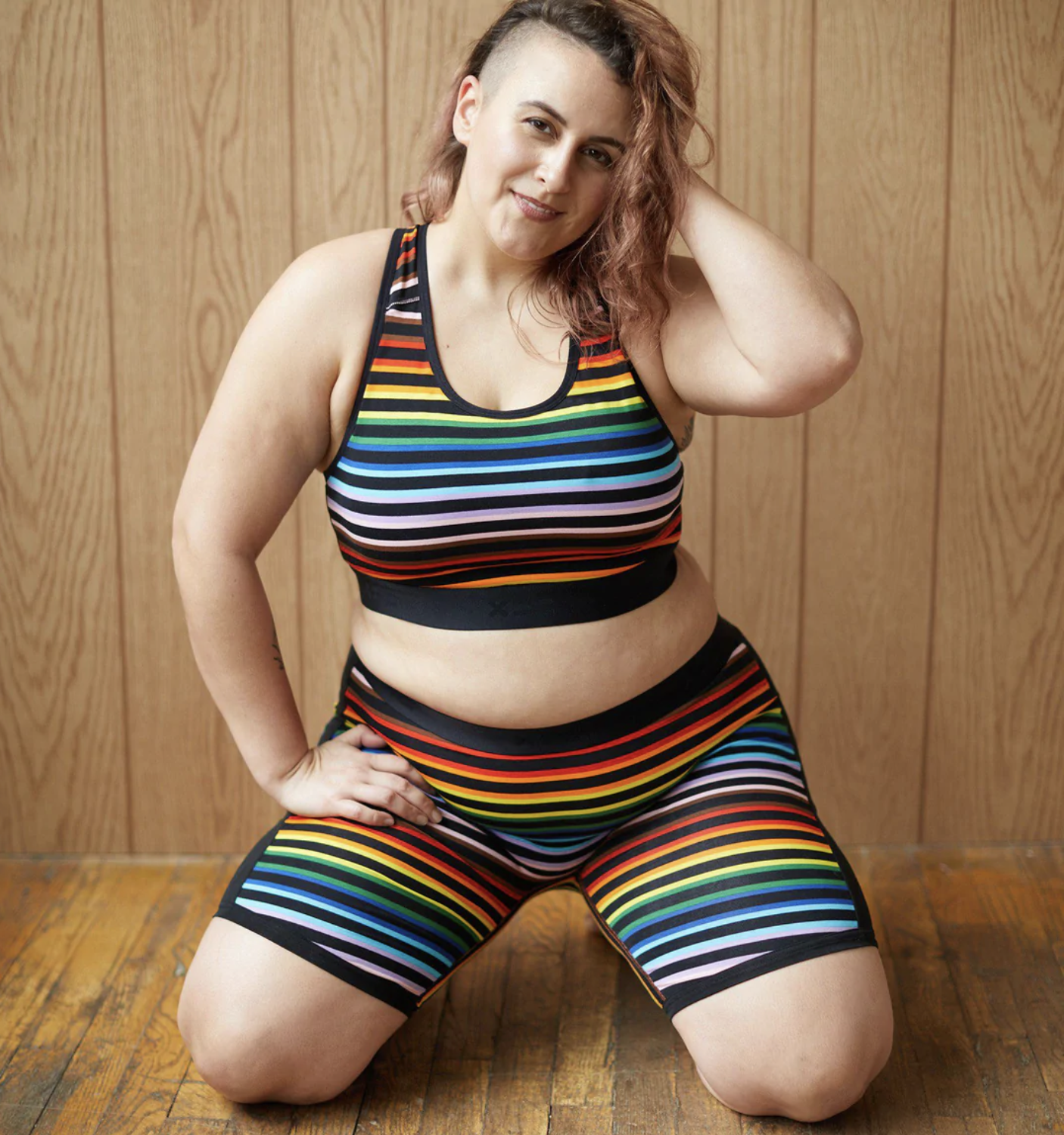 A model wearing rainbow comfy undies from TomBoyX